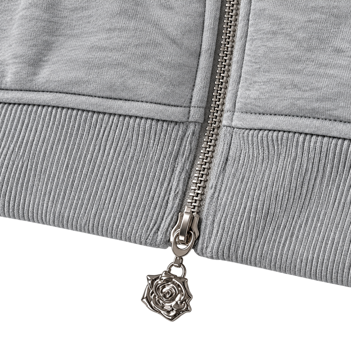 Signature Hoodie Product V6 Grey Melange. Nahaufnahme des grauen Maison De La Rue Hoodies mit Reißverschluss.